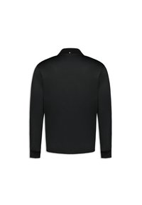 Polo shirt nero a maniche lunghe con colletto, realizzato in tessuto liscio. Presenta un piccolo logo nel collo.
