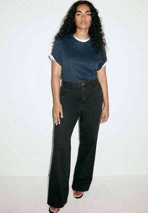 Mango, ADULT - Vaqueros a campana - black denim