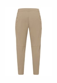 Pantalon beige fuselé avec passants de ceinture et détails de couture aux genoux, présenté de dos sur un fond blanc.