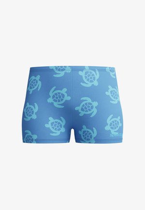 Bañador azul con un patrón de tortugas marinas azul claro y un pequeño logo blanco de Speedo en la parte inferior derecha.