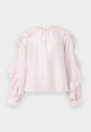 Blusa rosa con mangas con volantes y escote fruncido. Fabricada en tejido ligero, tiene puños elásticos y un corte relajado.