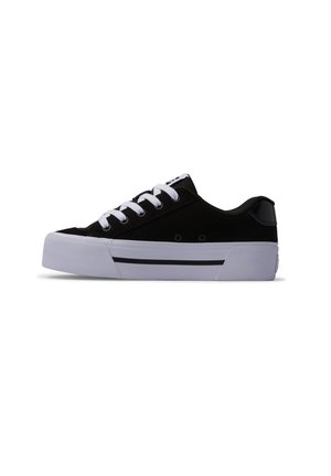 Zapatillas de lona negras con cordones blancos, puntera redonda y una suela blanca gruesa que presenta una franja negra y un sutil logo en la lengüeta.
