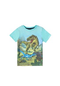 T-shirt a maniche corte di colore azzurro chiaro, con una grafica colorata di un dinosauro. Il materiale è morbido, con la scritta "Dino World" in basso a destra.