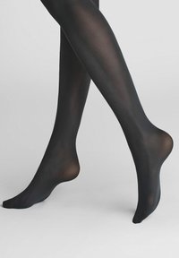 Black sheer tights with a smooth, slightly glossy finish, showcasing a fitted design and seamless toes. Translucent texture around ankles.