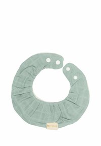 Kruhový svetlozelený látkový podbradník s vráskavou textúrou, bielou vnútornou podšívkou a dvoma patentkami; obsahuje malú značkovú štítok.