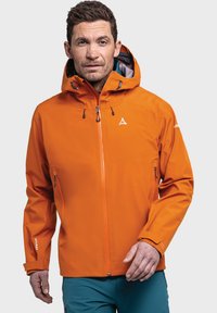 Helle orange, wasserdichte Jacke mit Kapuze, Reißverschluss vorne und Seitentaschen. Sie hat elastische Bündchen und verstellbare Kordeln für die Passform.