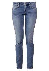 Ljusblå jeans modell skinny i denim med en slät textur, fem fickor och silverknappstängning. Blekt tvättmönster vid låren och knäna.