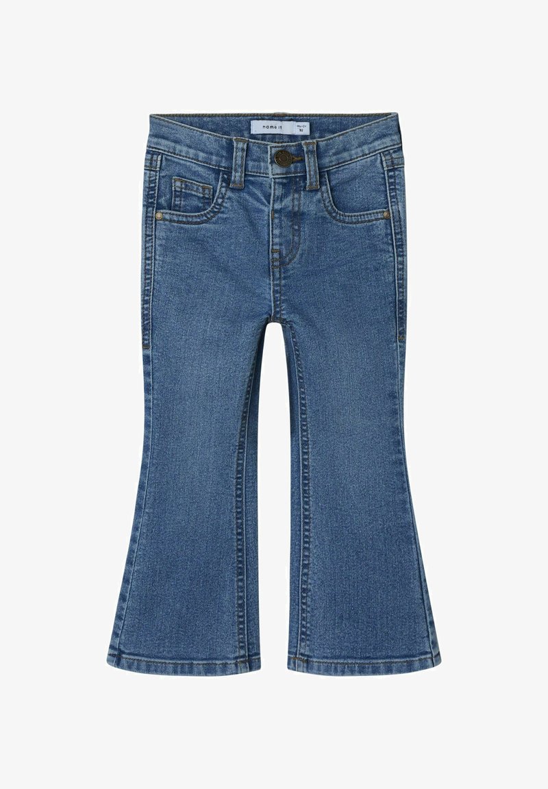 Denim flared jeans in medium blue with a button closure, two front pockets, and contrasting stitching. Features a flat front and flared hems.