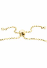 Guld bollkedja med ett runt lås och växlande släta och texturerade pärlor. Designen är enhetlig och elegant.