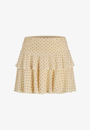 Jupe beige à volants avec des pois marron, ourlet évasé et taille froncée.
