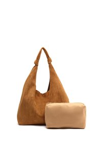 Suede tan shoulder bag with a knotted handle, featuring a zippered beige pouch as a separate accessory. Soft texture, unstructured shape.