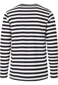 Maglietta a maniche lunghe con righe orizzontali bianche e nere, realizzata in cotone, con scollatura rotonda e un design a vestibilità rilassata.