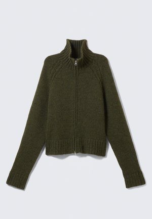 Olive green zip-up sweater, ribbed collar and cuffs, textured knit, cropped length, with a smooth zipper closure at the front.
