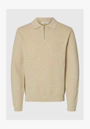 Béžový pulovr s límečkem ve stylu polokošile, se krátkým zipem. Texturovaná žebrovaná pletenina a přiléhavé manžety s žebrováním na lemu.
