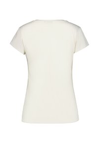 T-paita lyhyillä hihoilla, pyöreä kaula-aukko vaaleassa beigeessä, valmistettu pehmeästä puuvillasta. Ominaisuudet: sileä pinta ja vartalonmyötäinen leikkaus ilman koristeita.