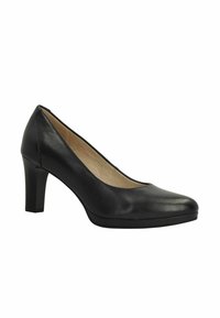 Zwarte leren high heel schoen met een puntige neus, een gladde textuur en een gemiddelde hakhoogte. Het interieur is gevoerd met een lichtbeige materiaal.