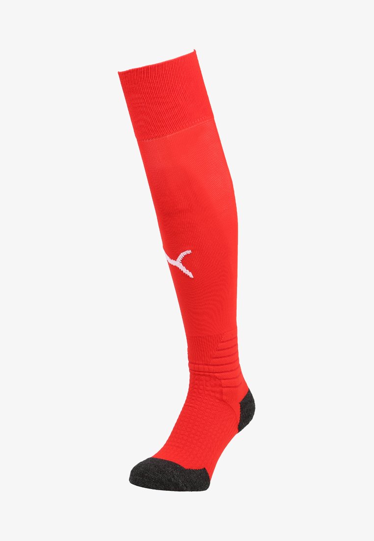 Meia de futebol vermelha com textura canelada, apresentando um pé acolchoado preto e um destaque de logotipo branco. Projetada para cobrir a panturrilha.