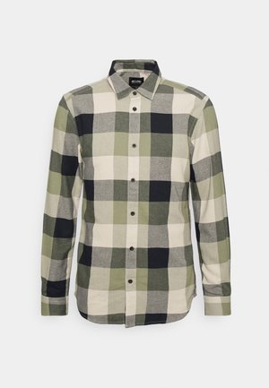 Button-up shirt featuring a checkered pattern in green, navy, and cream colors. Made from fabric with a smooth texture and collared design.