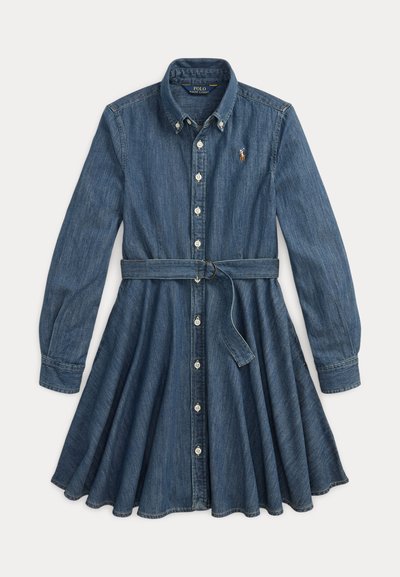 Farmering ingruha hosszú ujjakkal, gombos elülső rész, karcsúsított derék övvel, bővülő szoknyával és logó hímzéssel a mellrészen.