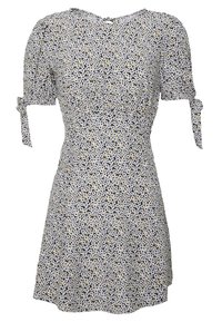 Kukkamekko valkoisena, harmaana ja keltaisena, lyhyillä puffihihnoilla, solmittavilla yksityiskohdilla ja liehuvalla helmalla; kankaassa on tekstuuria ja pieniä kuvioita.