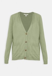 Ljusgrön cardigan i mjukt material med V-ringning, två framfickor och fyra träknappar i mitten. Texturerade stickade detaljer.