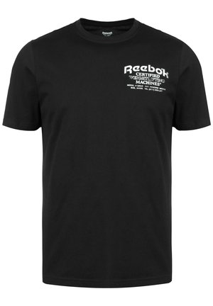 Czarna bawełniana koszulka z białym napisem na lewej piersi. Napis zawiera nazwę marki oraz "Certyfikowane maszyny do podnoszenia ciężarów."