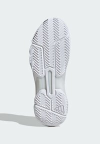 Semelle de chaussure en caoutchouc blanc avec un motif en chevrons texturé. Présente un design moulé distinctif et une découpe centrale pour plus de flexibilité.