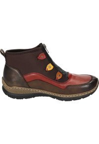 Bottine en cuir marron avec des accents rouges, fermeture éclair et formes de feuilles colorées décoratives. Semelle texturée pour une meilleure adhérence.
