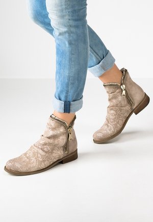 Korte laarzen - beige