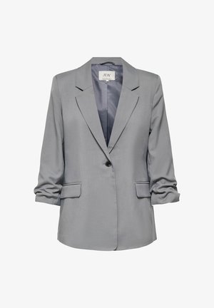 Veste femme gris clair avec col cranté, fermeture par un bouton noir, manches longues froncées et deux poches avant à rabat.