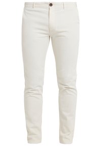 Chinos couleur crème en coton avec une coupe droite, dotés d'une fermeture avant à boutons et de passants pour ceinture. Texture lisse, détails minimalistes.