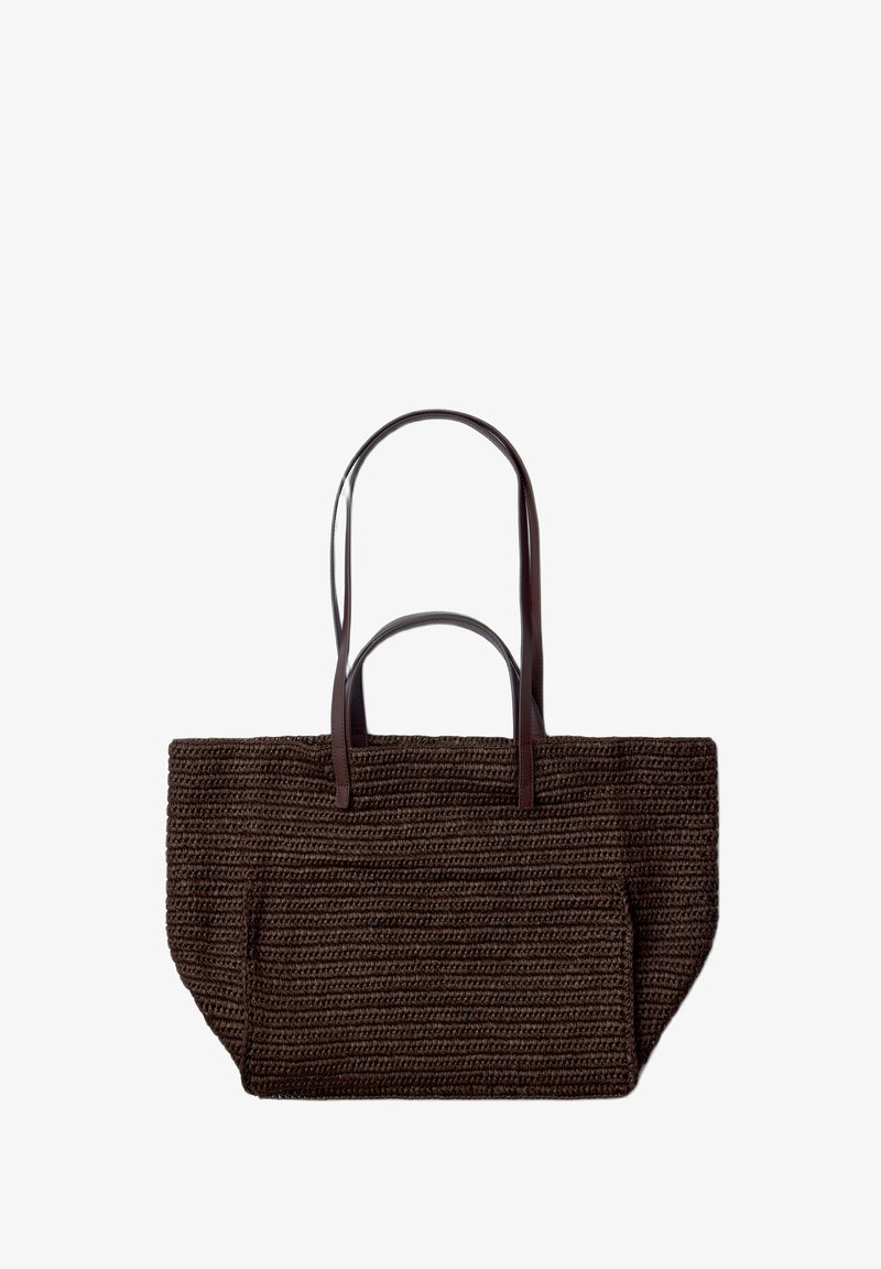Sac cabas tissé brun foncé avec deux poignées courtes et deux longues en cuir, présenté sur fond blanc.