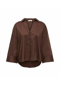 Blouse marron à manches longues avec boutons, poignets larges, col et ourlet légèrement arrondi, présentée sur un fond blanc.