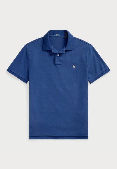 Navyblaue Poloshirt aus Baumwolle. Mit geripptem Kragen, Knopfleiste mit zwei Knöpfen, kurzen Ärmeln und einem kleinen gestickten Logo auf der Brust.