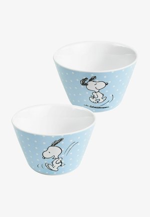 Ceramic bowls with a light blue polka dot pattern, featuring a cartoon dog. The interior is white, and the shape is slightly conical.