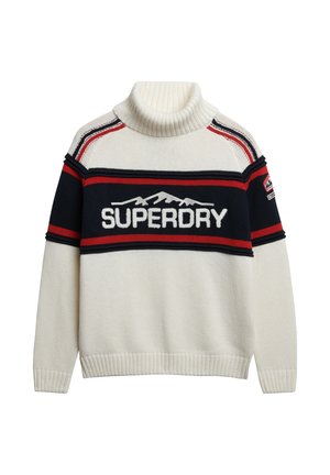 Pull en col roulé crème avec des rayures bleu marine et rouge, présentant un graphique montagne et le texte "SUPERDRY" sur la poitrine, ainsi qu'un patch logo sur la manche.