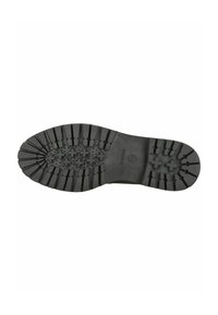 Suela de zapato de goma negra con un dibujo texturizado que presenta patrones de pequeños signos de más y surcos para mayor agarre y tracción.