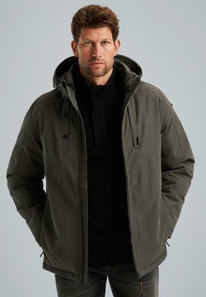 Dark green hooded jacket with a zip front, snap buttons, and two chest pockets, layered over a black sweater. Soft, textured fabric.