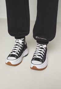 Champion Rochester ELASTIC CUFF PANTS - Treningo apatinė dalis - black