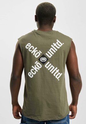 Olive green sleeveless t-shirt with large white text graphics reading "eckō un1td." across the back. Soft cotton fabric, relaxed fit.