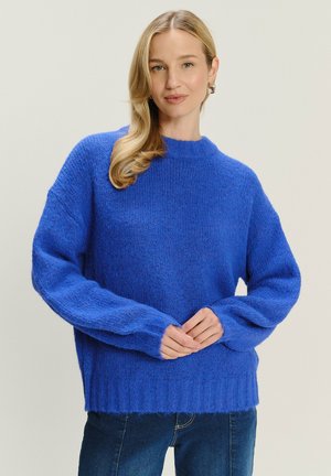 - Sweter
