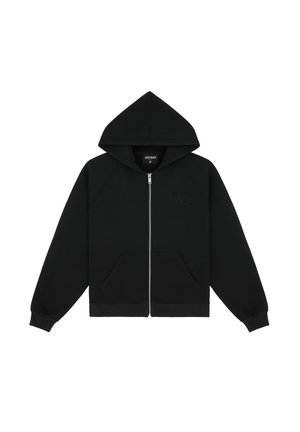 Czarna bluza z kapturem na zamek błyskawiczny z dużym kapturem, rękawami typu raglan, przednimi kieszeniami kangurzymi oraz subtelnym wytłoczonym logo na klatce piersiowej. Materiał bawełniany.