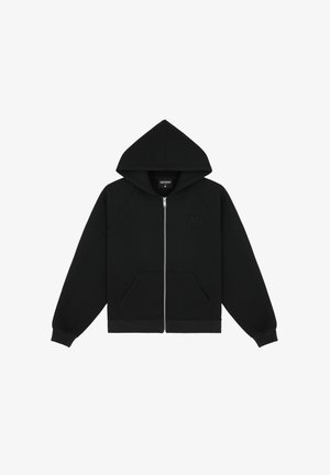 Black zip-up hoodie featuring a large hood, raglan sleeves, kangaroo front pockets, and a subtle embossed logo on the chest. Cotton material.