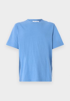Blue short-sleeve t-shirt made from soft fabric with a crew neck and a relaxed fit. Features a small logo tag at the bottom left.