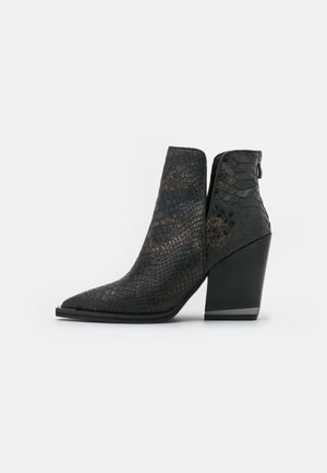 Bottines à talons hauts - black