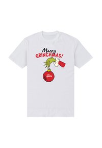 Bílé tričko se zelenou rukou Grinche držící červenou ozdobu a červeným nápisem "Veselý Grinchmas!" nad obrázkem.
