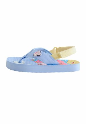 Modrá a žltá detská sandála s potlačou jednorožca z rozprávky a usmievavou ružovou tvárou zvieraťa na remienku, s remienkom vzadu pre oporu.