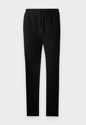 Pantalones de chándal negros con un corte ajustado, cintura elástica y cordón. Hechos de una tela suave con una textura lisa y sin patrones visibles.