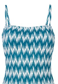 Mėlynos ir baltos spalvos raštuotas tank topas su plonomis petnešomis, turintis zigzago dizainą ir tekstūruotą audinį. Klasikinė iškirptė ir prigludusi forma.