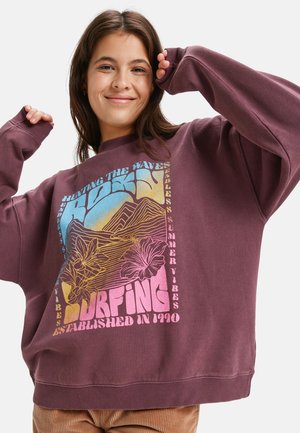 Sweatshirt oversized de culoare mov, cu un design grafic multicolor ce reprezintă valuri și flori, având manșete și tiv cu desene în relief.